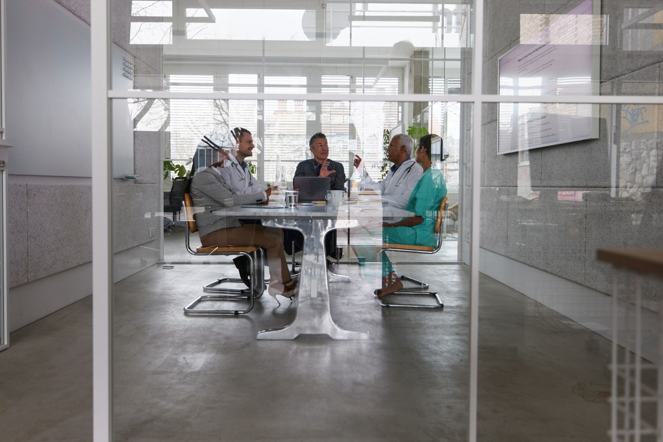 Meeting with medical professionals in a hospital office