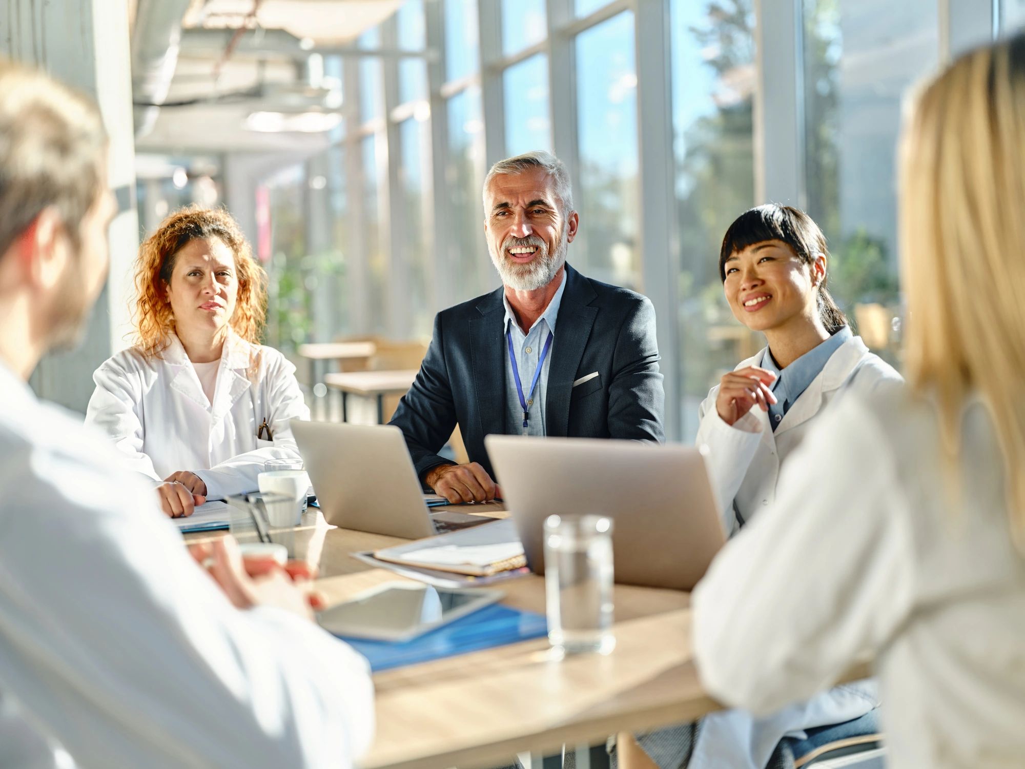 Hospital staff meeting in a conference room