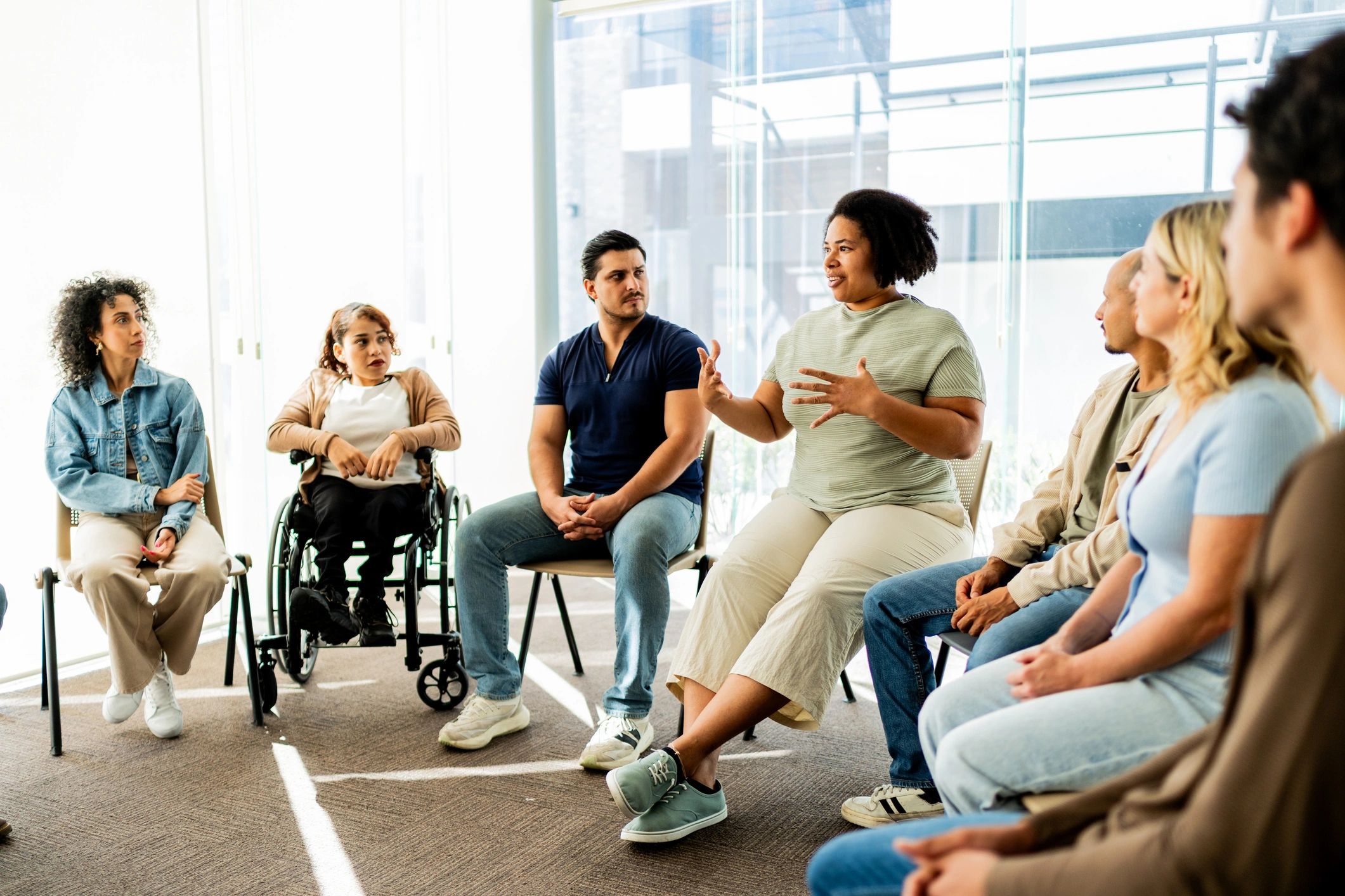 Facilitator speaking during a group discussion