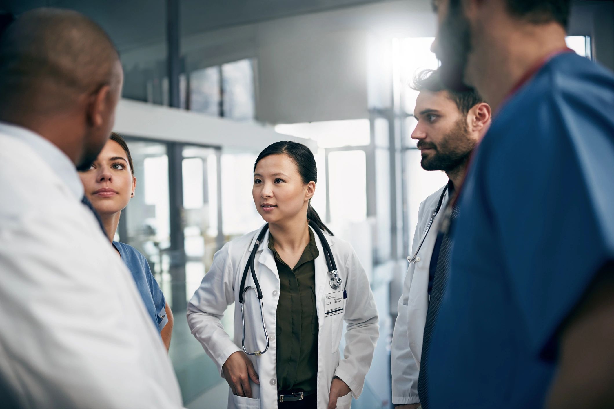 VA healthcare staff in a team discussion